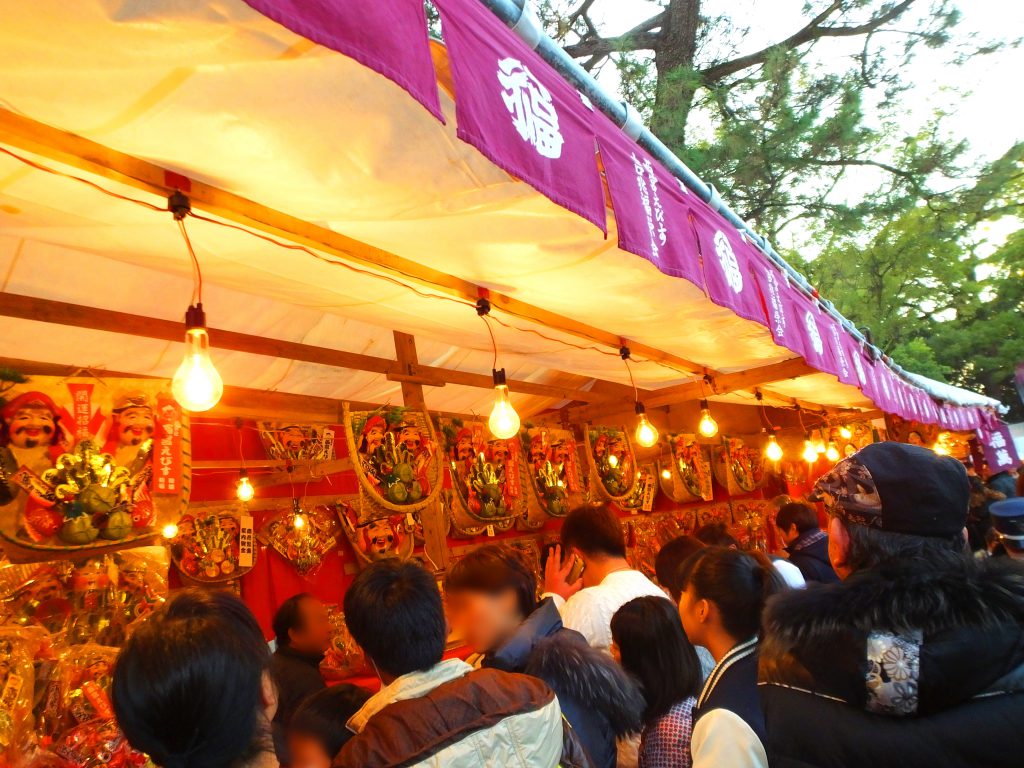 winnowing baskets with lucky items and faces of Ebisu-sama