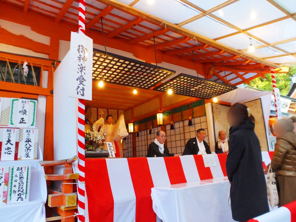 a Shinto priestess, miko