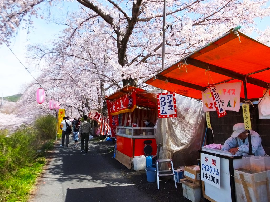 food stalls under cherry trees