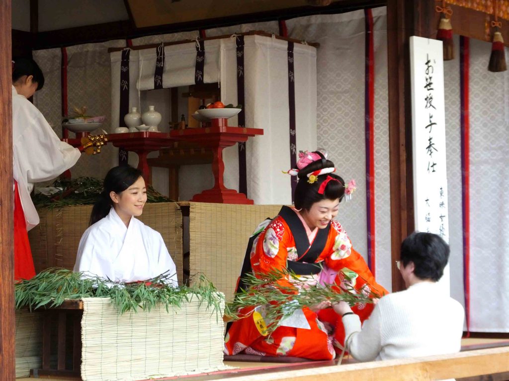 handing over of the bamboo branches