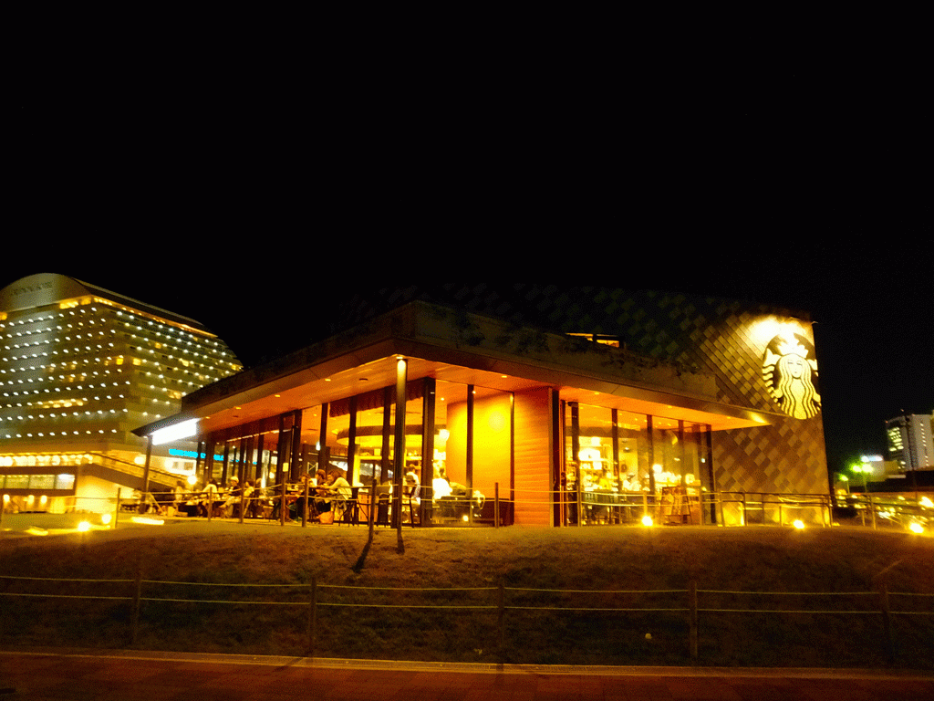 the Starbucks and the surrounding area in the evening