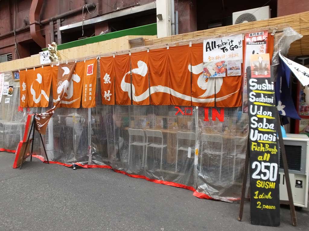 a sushi restaurant and a cake shop in the market